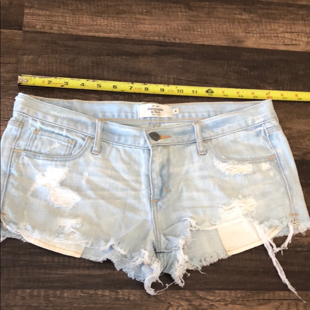 Distressed jean shorts.